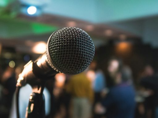 silver corded microphone in shallow focus photography